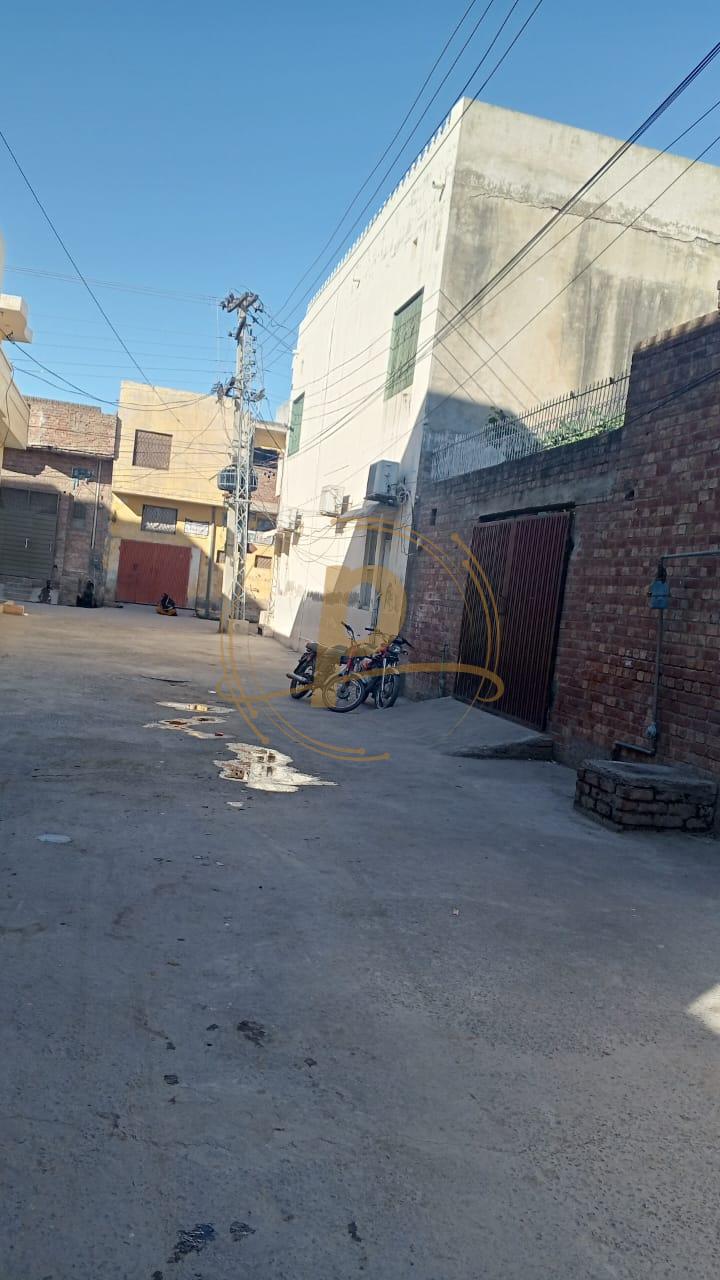 a motorcycle parked in a courtyard