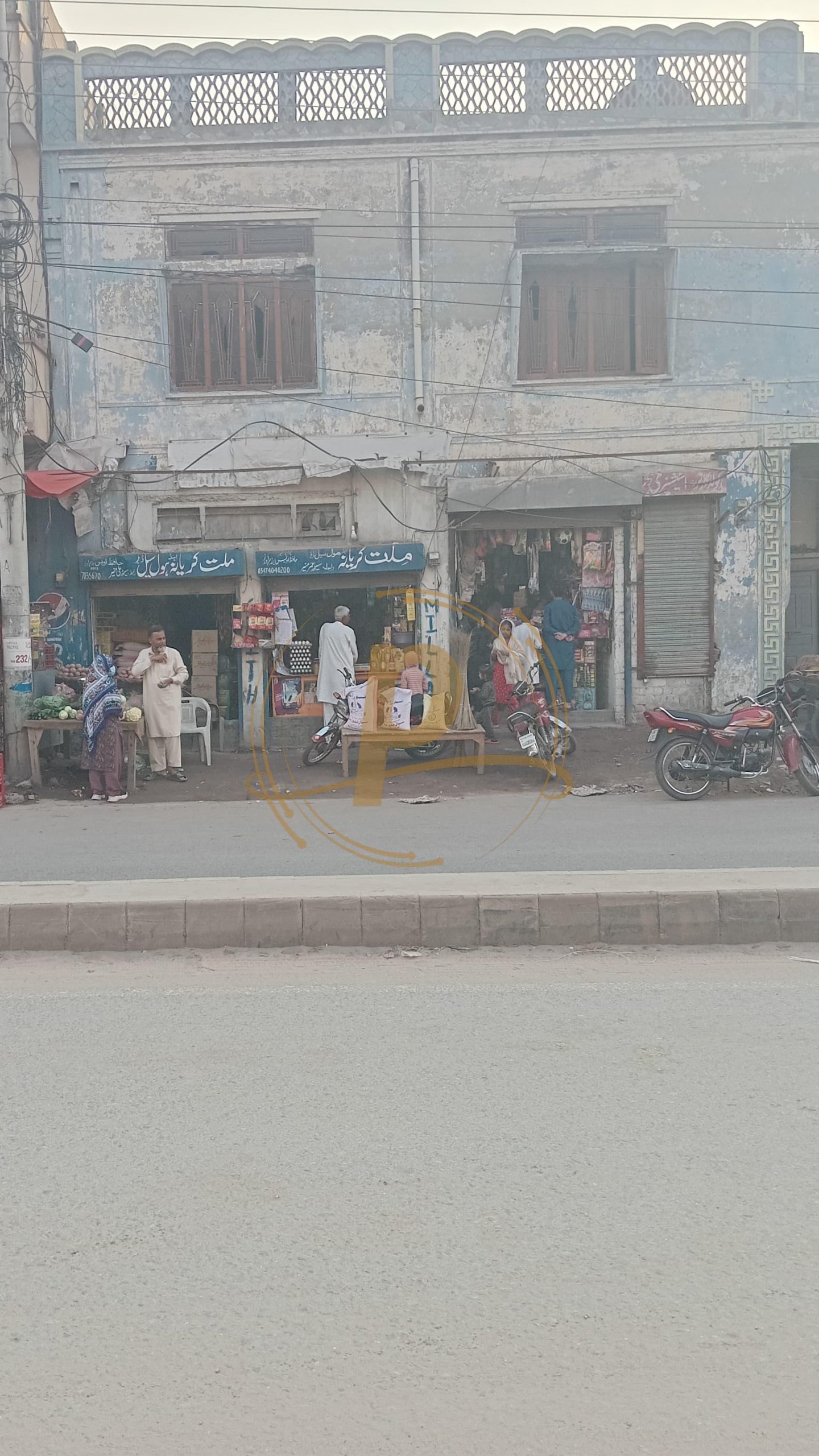 a group of people standing outside a store